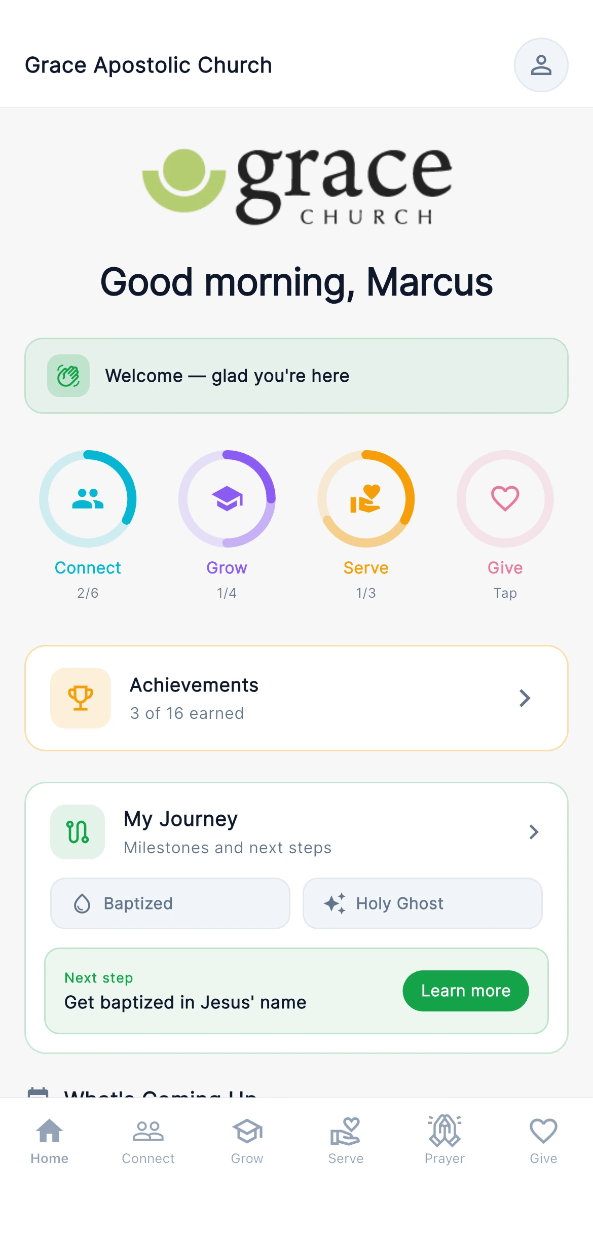The app's Home tab, showing a member their greeting, milestones and what is on this week